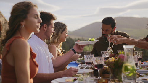 Friends having food at party