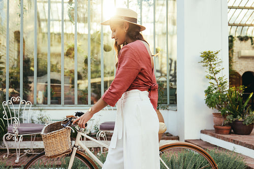 Attractive tourist woman going out for a bike ride