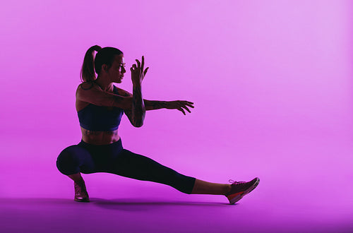 Woman doing warm up exercise
