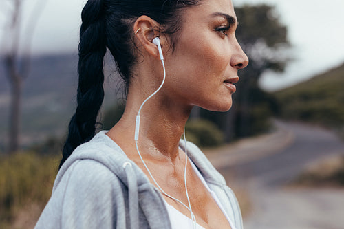 Woman taking break after morning workout