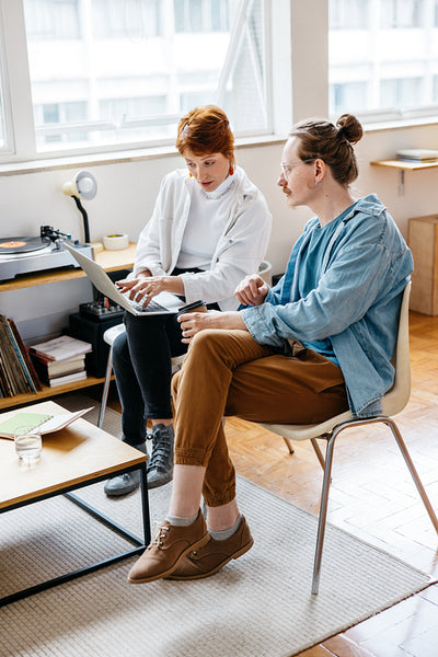 Freelance colleagues collaborating in modern co-working space
