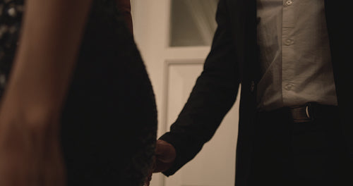 Romantic couple walking up the stairs