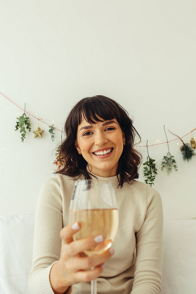 Close up of woman holding wine glass