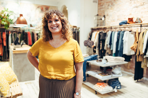 Portrait of female fashion store owner