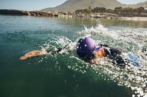 Man  swimming on a triathletic competition
