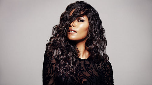 Beautiful brunette with wavy hairstyle