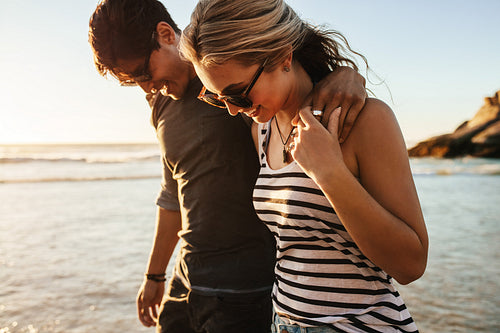 Happy young couple on beach holiday