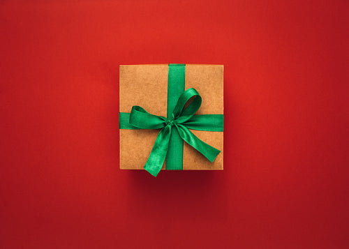Gift box on red background