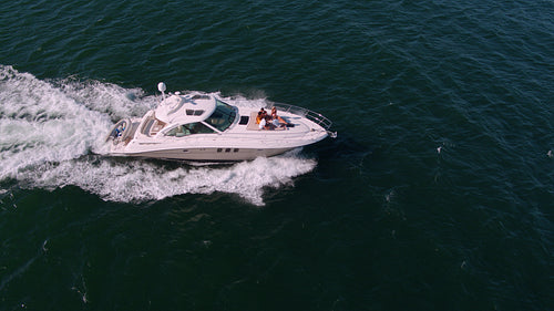 Friends relaxing on yacht deck