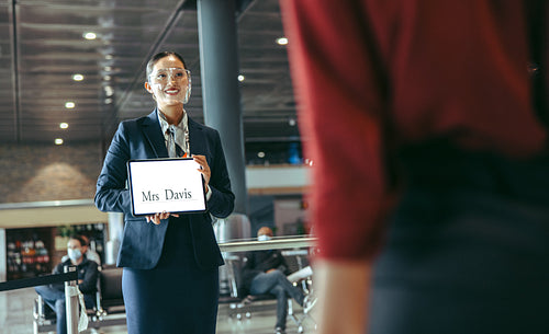 Driver with a sign on arrival terminal