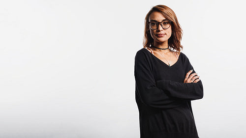 Woman standing with arms crossed