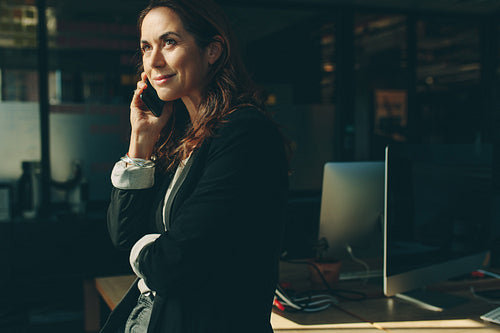 Business executive on phone call in office