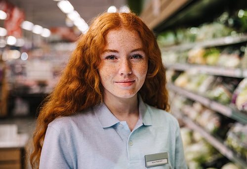 Closeup of a young shop assistant