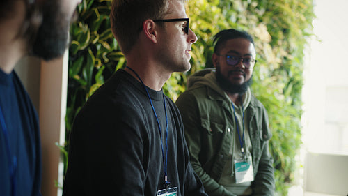Business men having a panel discussion in an office