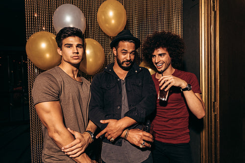 Young men partying at the nightclub