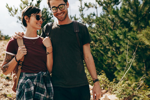 Explorer couple walking together in the countryside
