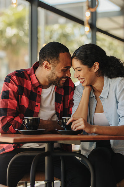 Loving couple having a great time at cafe