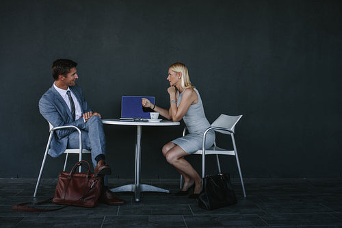 Business partners meeting at a cafe