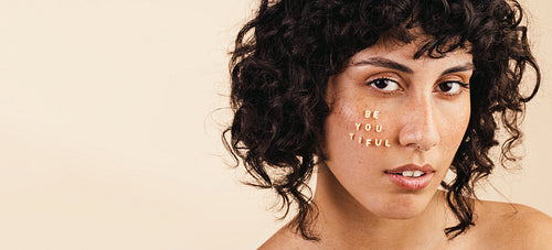 Confident young woman looking at the camera