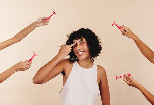Unapologetic young woman choosing not to shave her underarms
