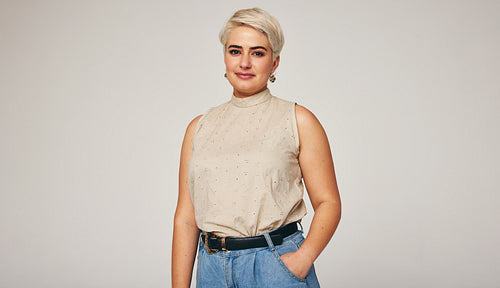 Stylish blonde woman looking at the camera