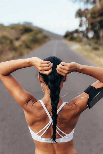 Young woman getting ready for training