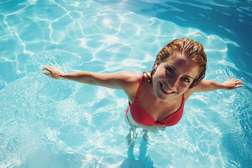 Beautiful woman in a swimming pool