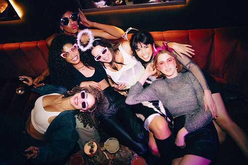 Group of friends at a fun night out in a lively atmosphere