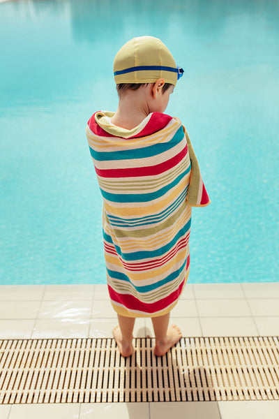 Boy drying off from swimming