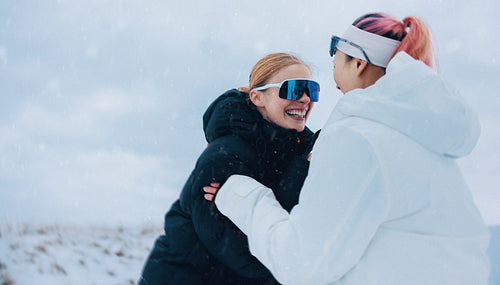 Women embrace friendship and resilience in winter training outdoors