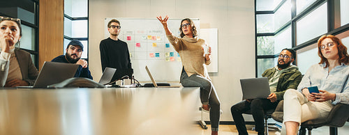 Tech company meeting: Professional networking discussion of business ideas