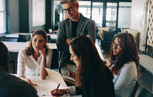 Group of creative people having a meeting