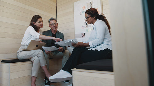 Business professionals discussing a new project