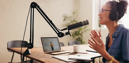 Woman broadcasting a podcast from home