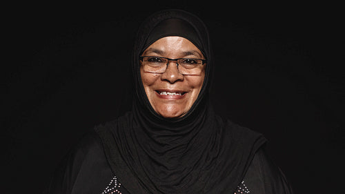 Smiling islamic woman in hijab