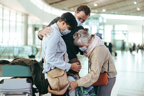 Senior woman welcoming her family at airport