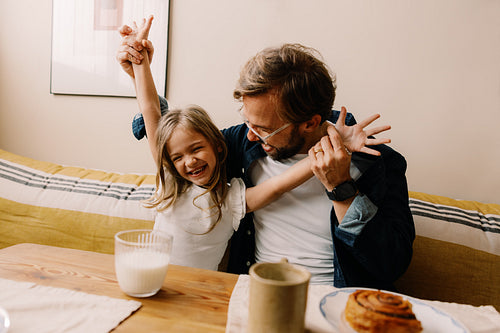 Family moment as father and daughter celebrate