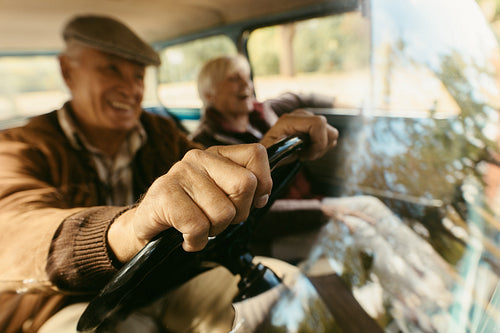 Senior couple out on a drive