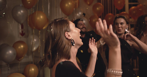 Group of people dancing in the night club