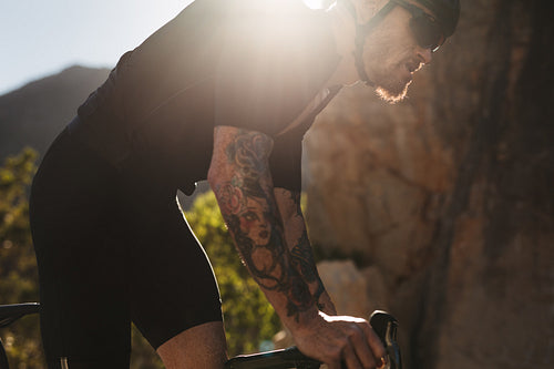 Cyclist practicing on mountain road