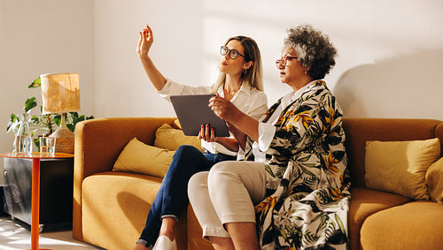 Interior designers discussing a new idea in a modern office