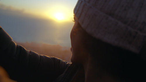 Loving couple on holidays with seascape in background