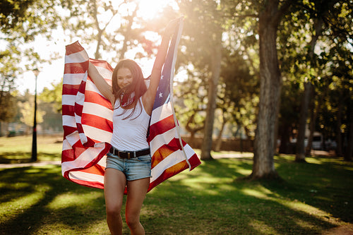 Girl celebrating independence day at park