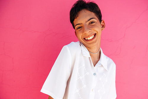 Young teenage boy feeling proud of his identity