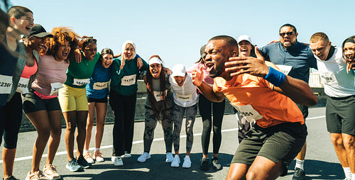 Diverse group of runners preparing for exciting race event