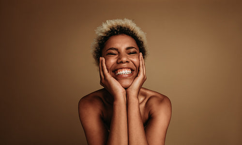 Close up of smiling african american female