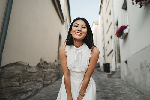 Woman having fun in an old city