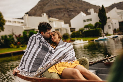 Romantic couple on a boat date in a lake
