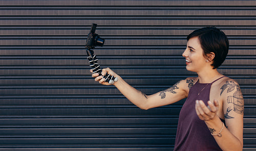 Female vlogger recording her vlog content