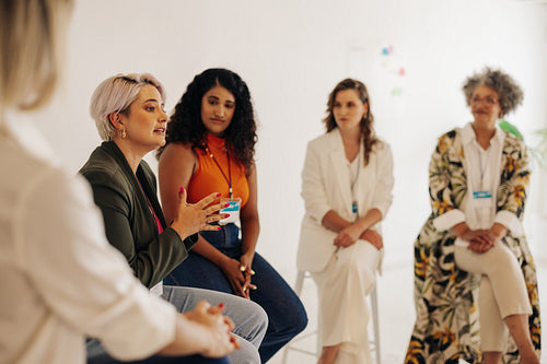 Confident businesswomen having a discussion during a conference 